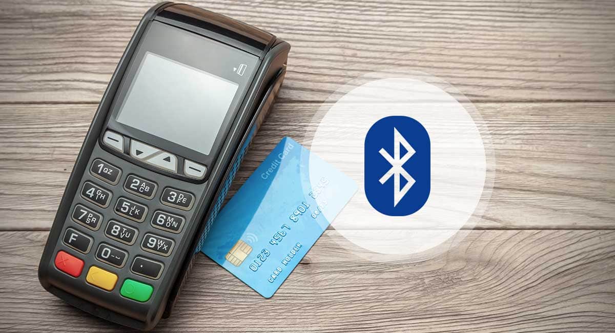 Máquina de cartão, cartão de crédito e símbolo do Bluetooth