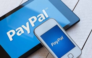Logo PayPal em celular e tablet